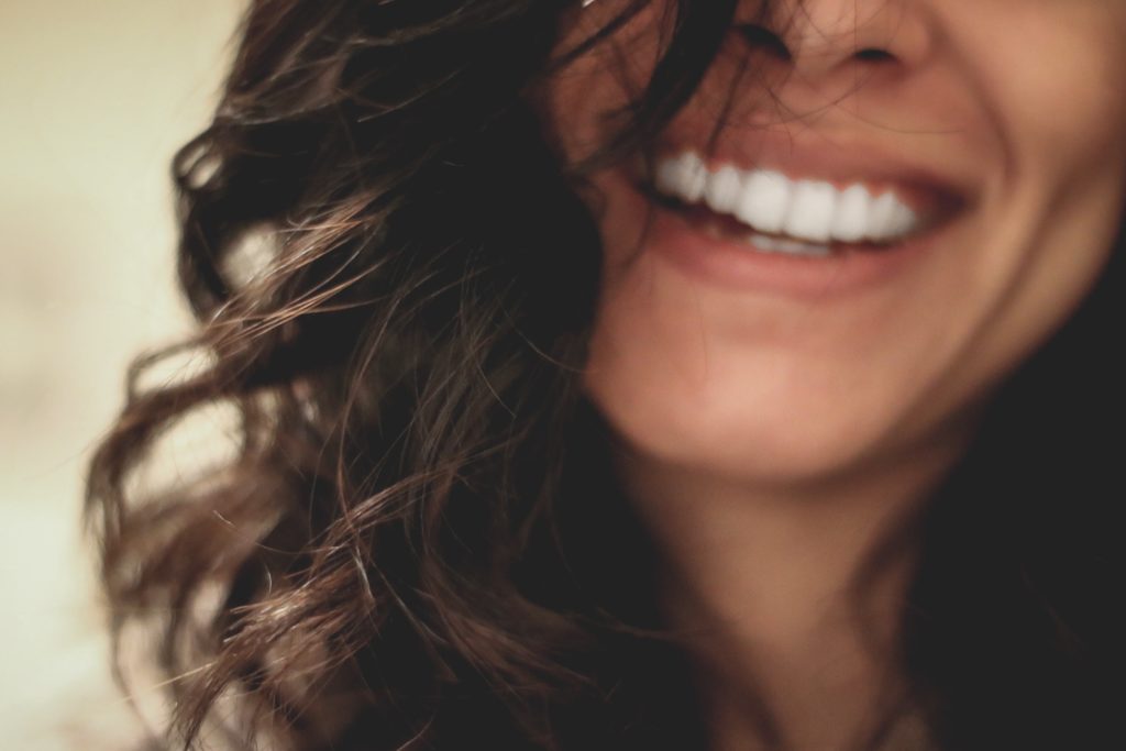 woman’s smile seen close up