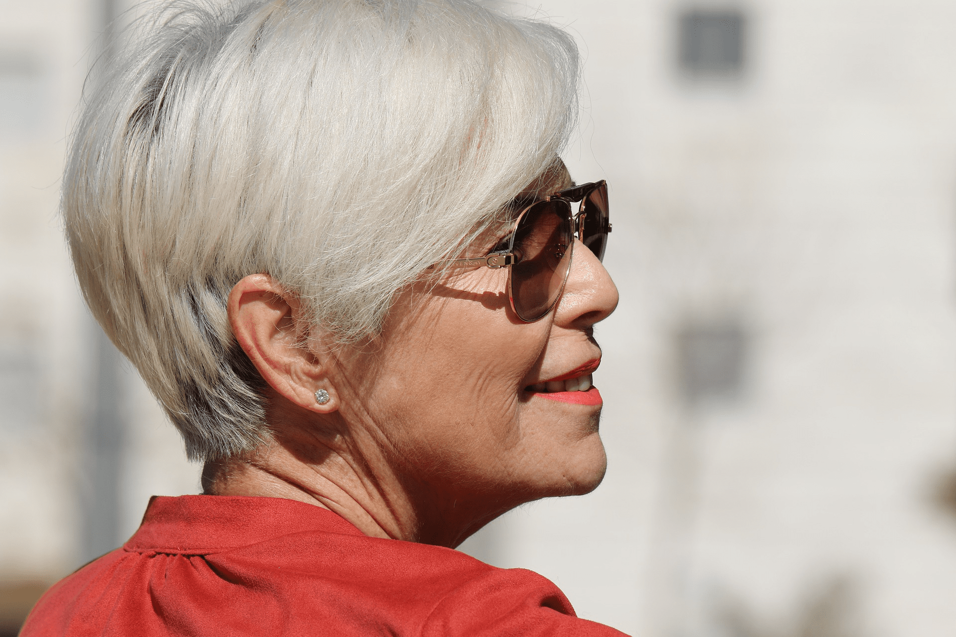 Woman smiling with dentures in