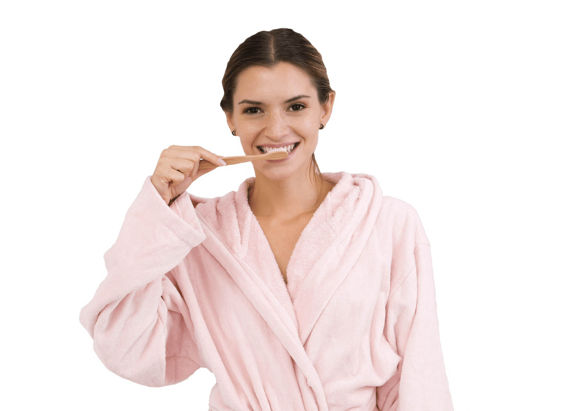woman in pink robe brushing teeth