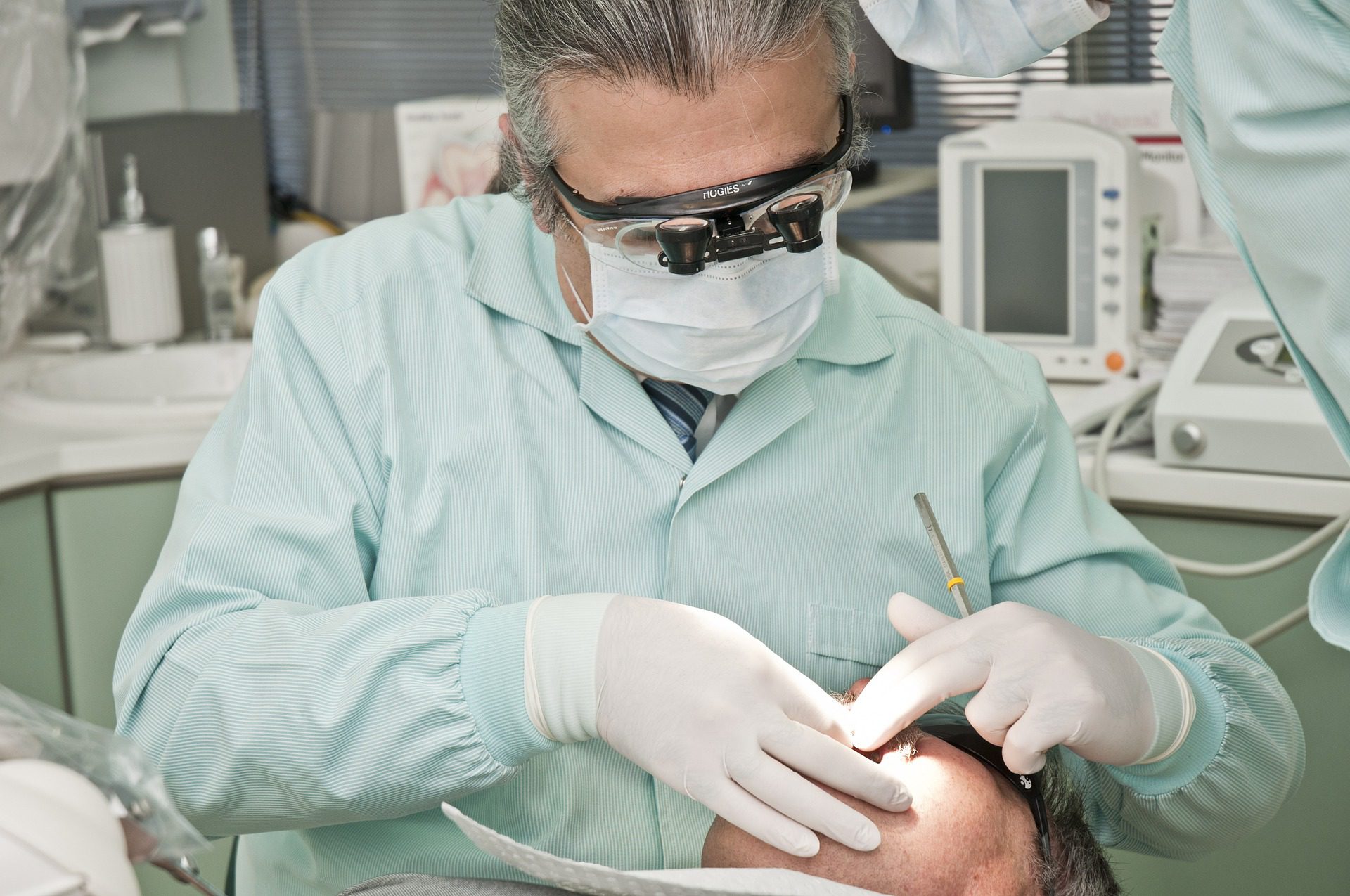 Dentist checking a patient’s teeth